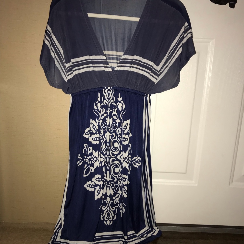 Navy blue dress with white details. Size L